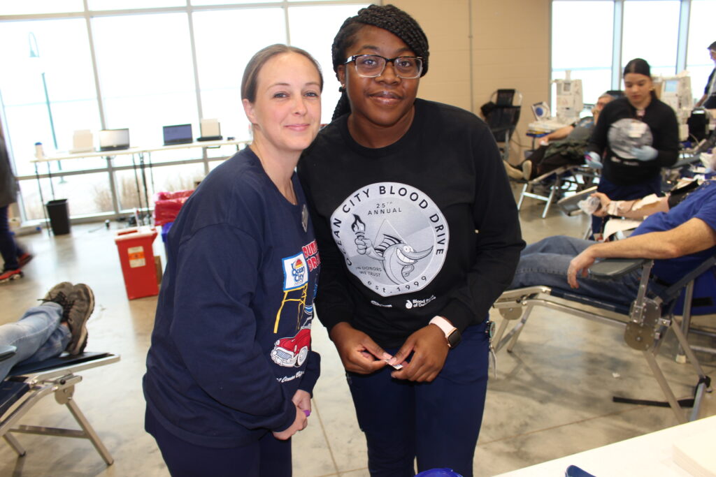 Two smiling BBD staff members.