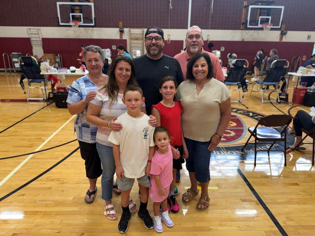 PJ with his parents John and Meghan with family