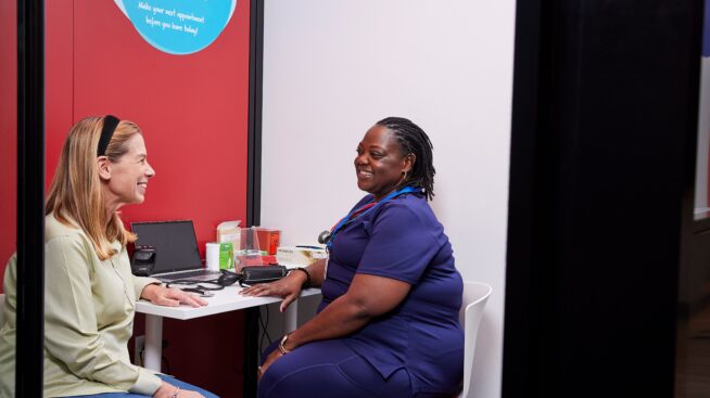 Blood donor asking questions at BBD Blood Center.